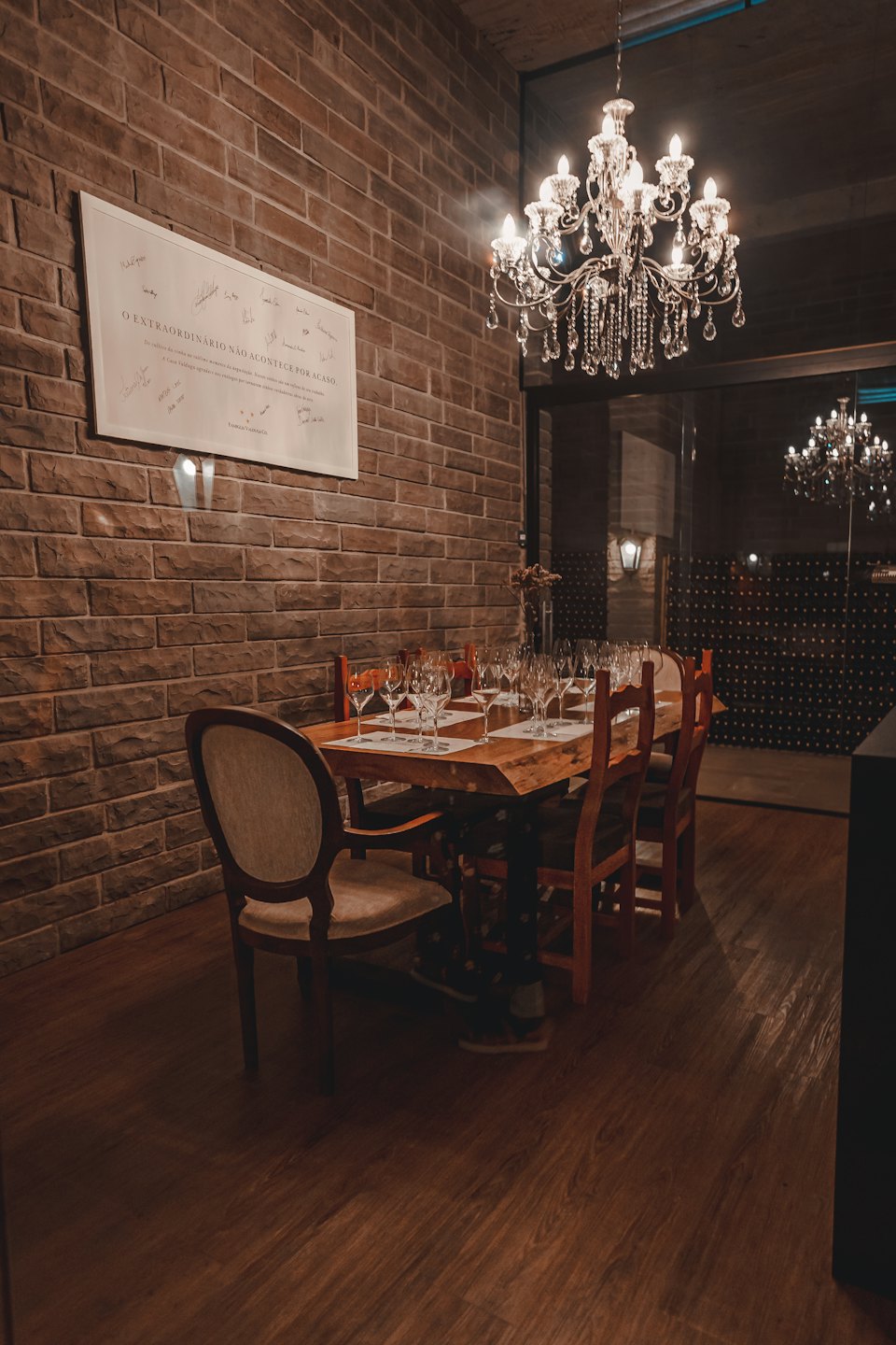 Elegant dining room table set for a formal wine tasting.